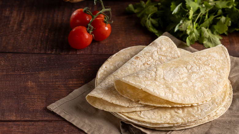 piled of freshly warmed corn tortillas