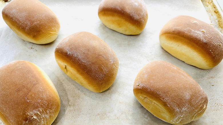 bread rolls in a baking pan