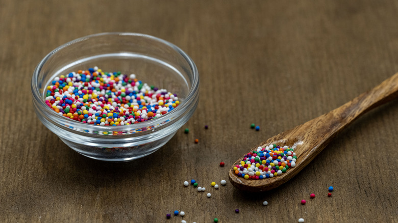 colorful sprinkles in a glass bowl