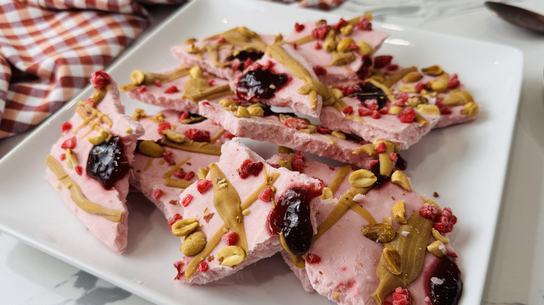 PB+J frozen cottage cheese bark pieces on plate