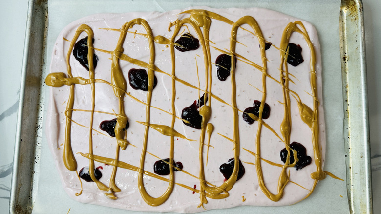 Peanut butter drizzled over cottage cheese bark