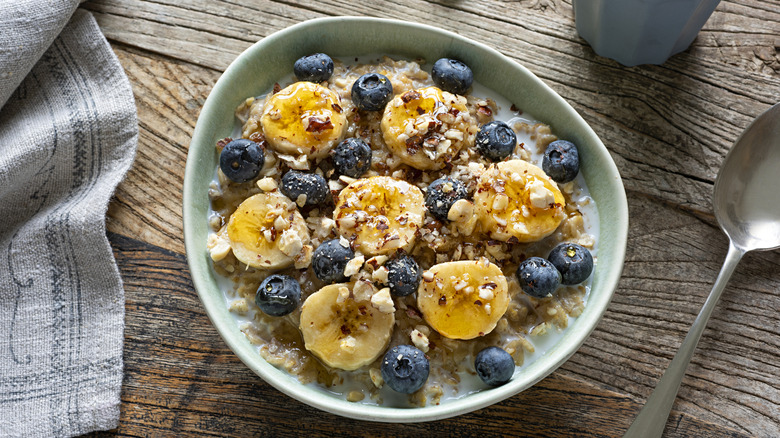oatmeal topped with bananas and blueberries