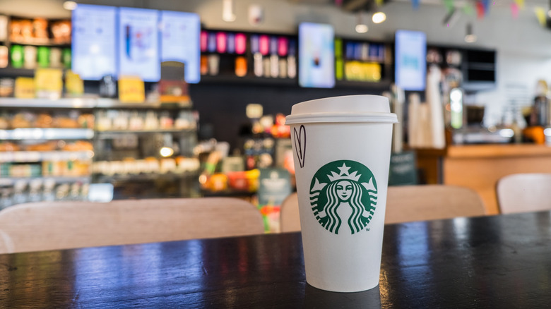 Starbucks cup on a counter