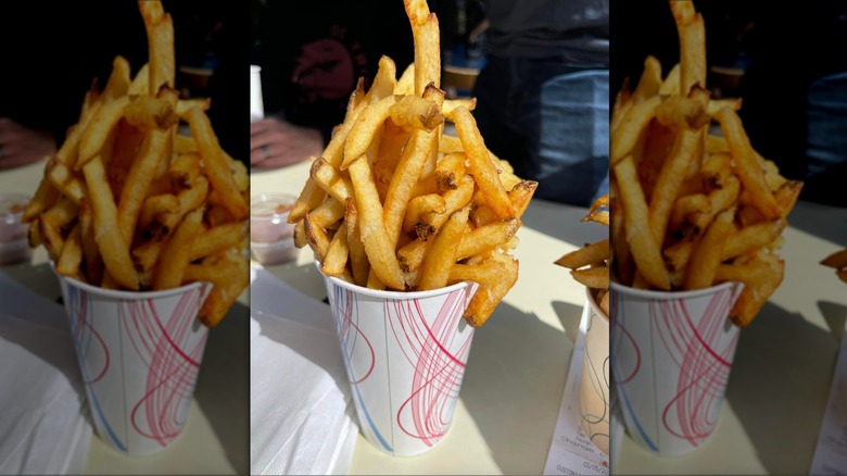 A cup overflowing with fries from Boardwalk Fries