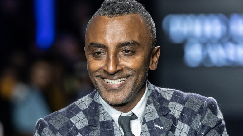 Chef Marcus Samuelsson smiling at an event.