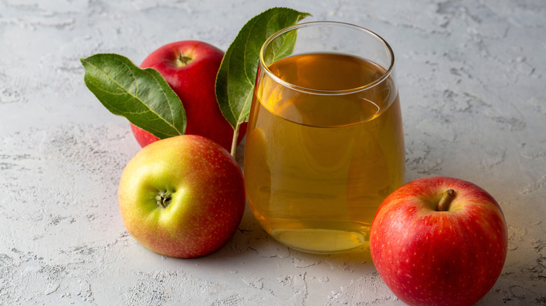 Apple juice in a glass.
