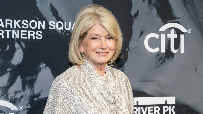 Celebrity chef Martha Stewart smiling at a red carpet event.