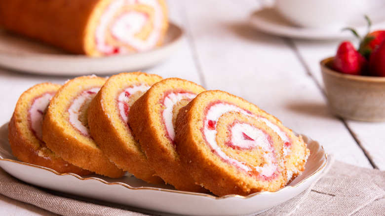 Swiss roll filled with strawberries and cream