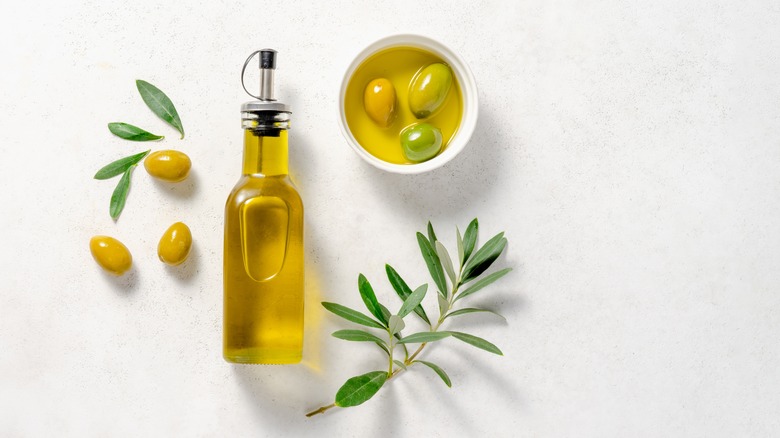 bottles of olive oil on a table