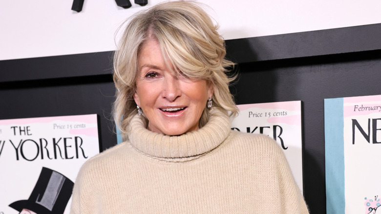 Martha Stewart smiling in a beige turtleneck at an event for The New Yorker