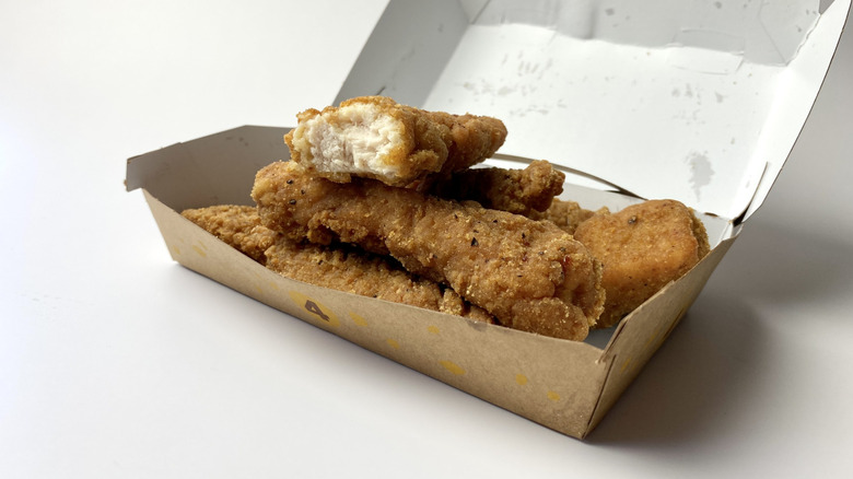 Box of McDonald's McCrispy Strips on white surface