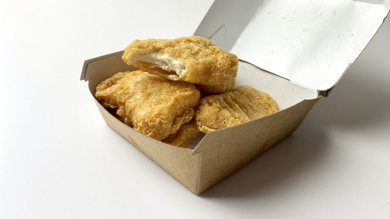 Box of McDonald's McNuggets on white surface