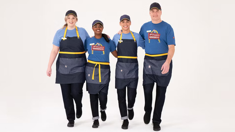 four American McDonald's employees arm-in-arm