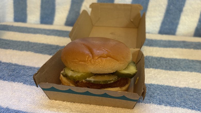 Filet-O-Fish sandwich with pickles in its box