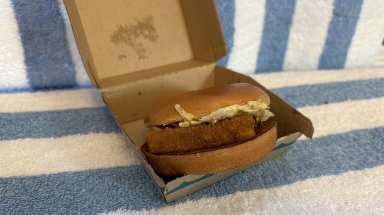 A Filet-O-Fish sandwich with Big Mac sauce sitting in its box