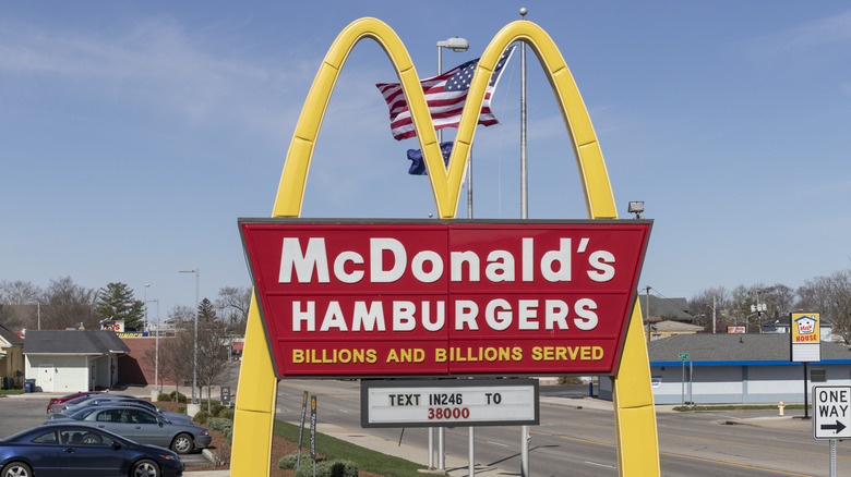 The sign for McDonald's hamburgers with the golden arches