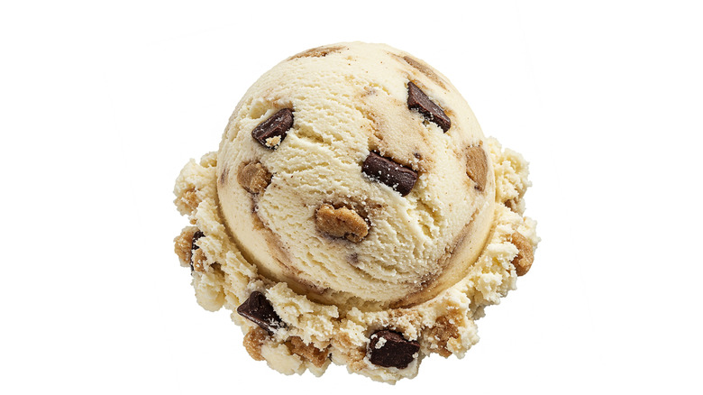 A scoop of cookie dough ice cream on a white background