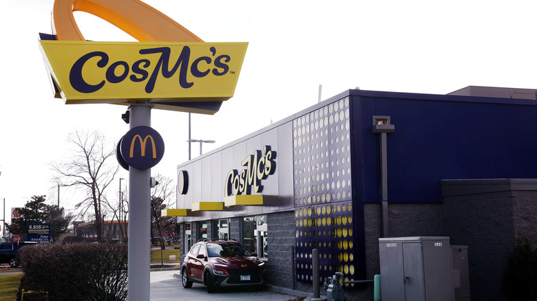 Car driving through the CosMc's drive-thru. 