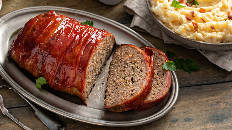 Bacon wrapped meatloaf on a plate