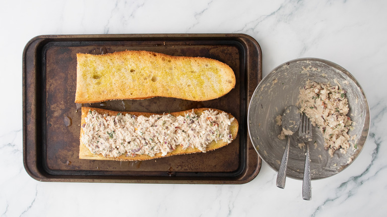 Tuna salad on a large toasted baguette.