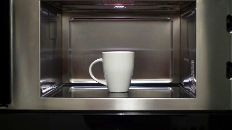 white mug in a microwave