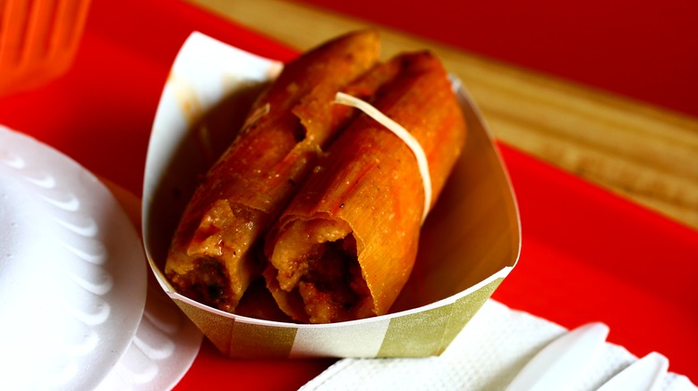 2 tamales from Hick's in Mississippi on a small paper tray.