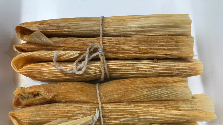 A bundle of wrapped-up Mississippi delta tamales.