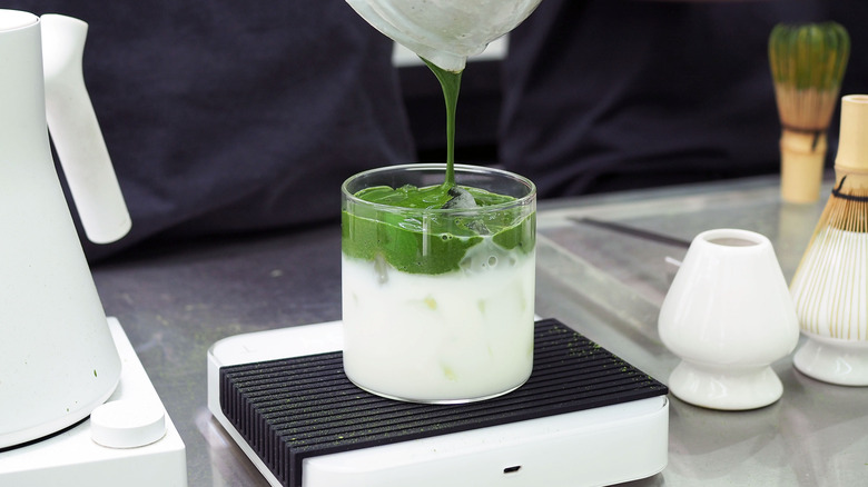Matcha latte on a kitchen scale