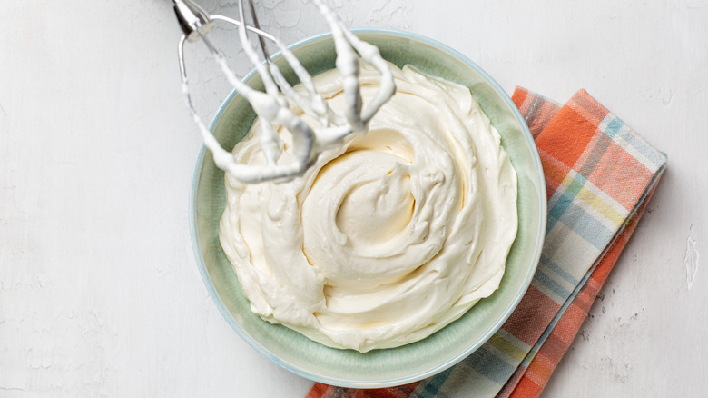 Whipped cream in a bowl.