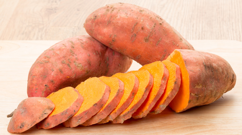 Sweet potatoes sliced and whole
