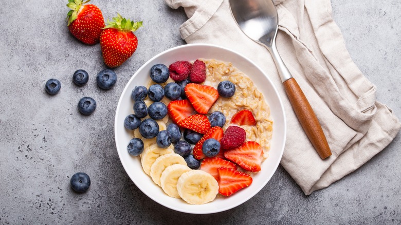 Bowl of oatmeal topped with fresh fruit