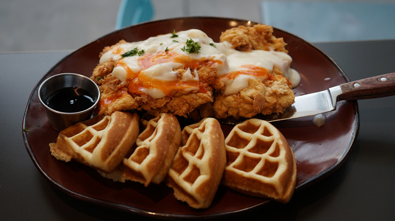 Whiskey chicken and waffles with syrup