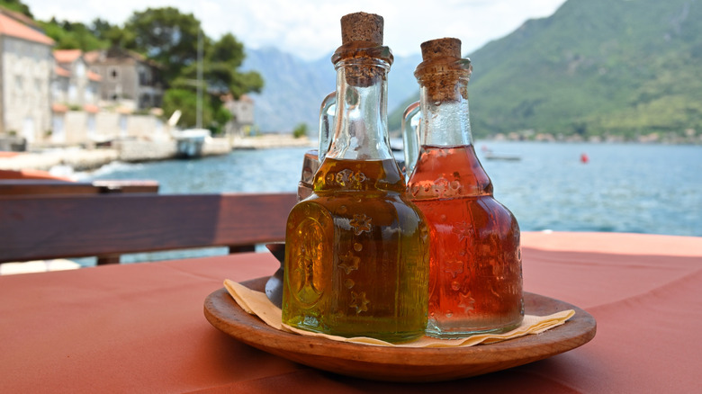 Olive oil on a table in a seaside restaurant in Montenegro.