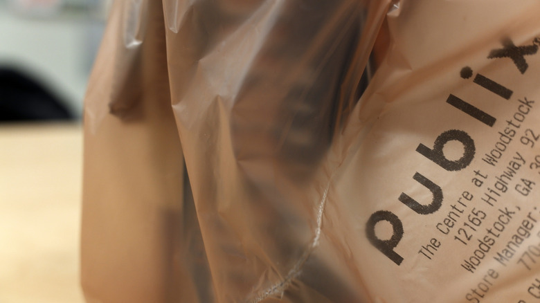 A Publix receipt in a shopping bag