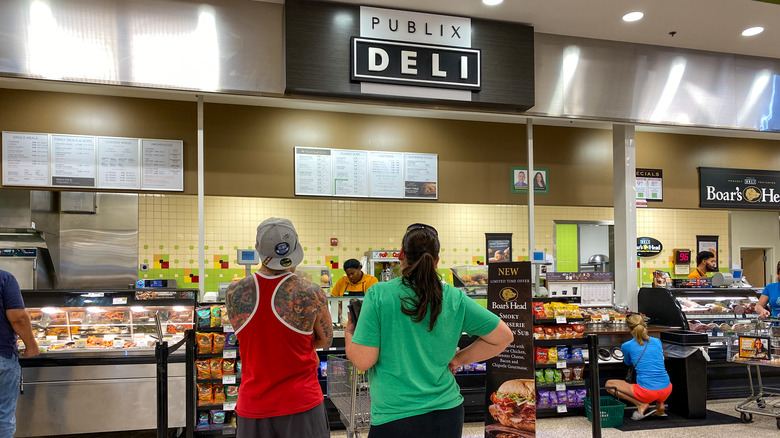 People in line at the Publix deli counter