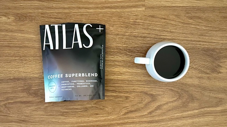 Package and cup of Atlas Coffee Superblend