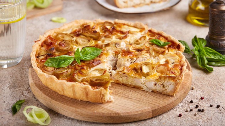 Quiche on wooden board