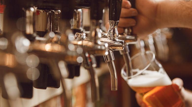 Beer being poured from a tap