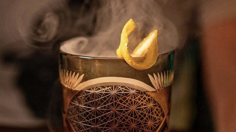 A smoking cocktail with Japanese whiskey at Paper Fan in Seattle.