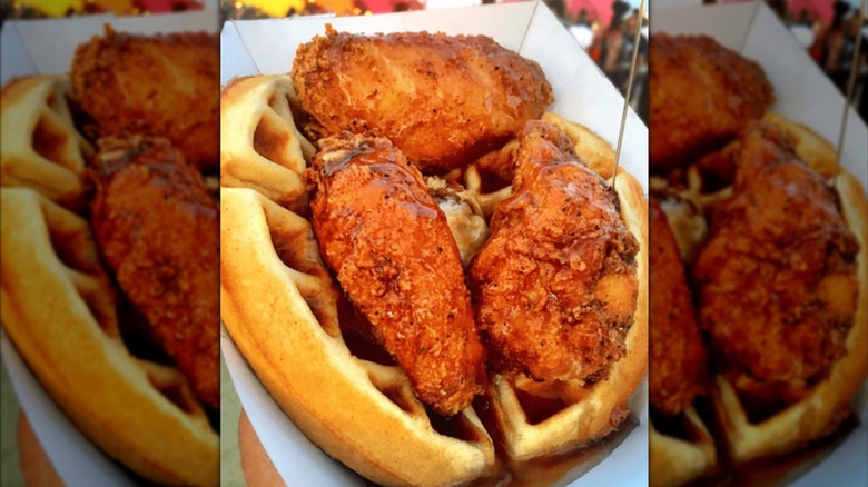 Buffalo wings on top of a waffle from Wings N Waffles