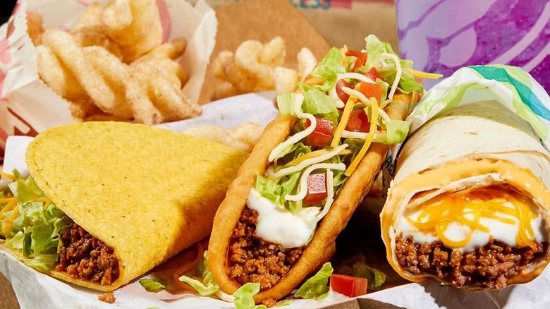 Taco Bell's Luxe combo box with a hard shell taco, beefy burrito, chalupa, and cinnamon twists