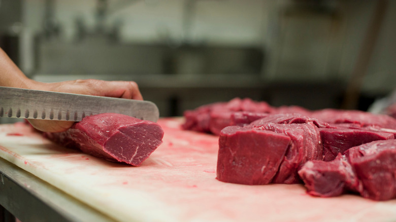 Chef preparing filet mignon