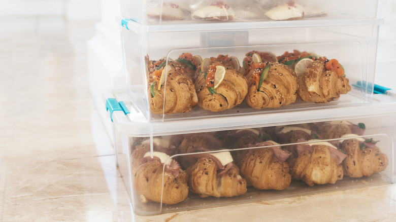 Croissants in plastic containers.