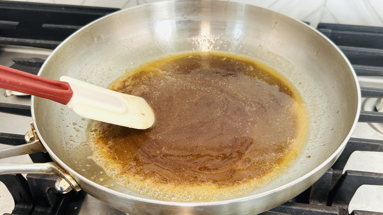 Butter and sugar mixture cooking in pan