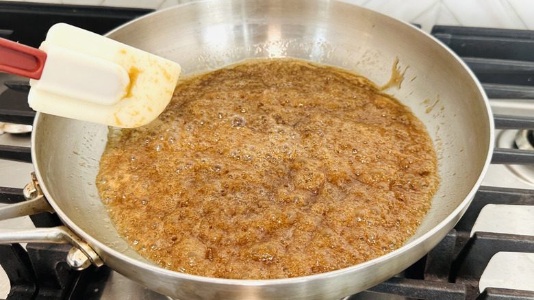 Bubbling caramel mixture in pan