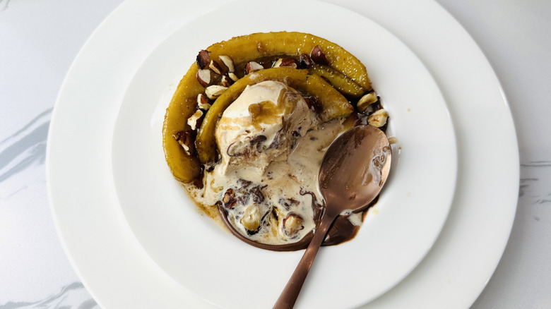 Partially eaten Bananas Foster on plate