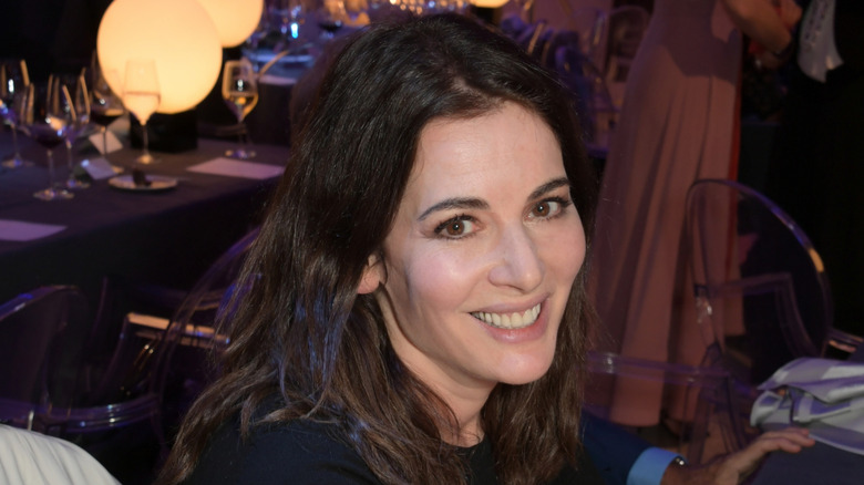 Nigella Lawson poses at a restaurant