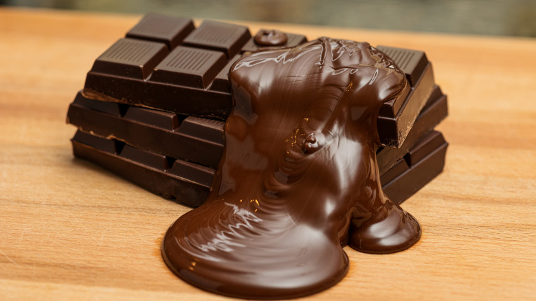 melted chocolate running over chocolate bars