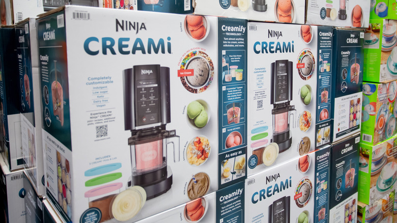 A display of Ninja Creami boxes on a store shelf
