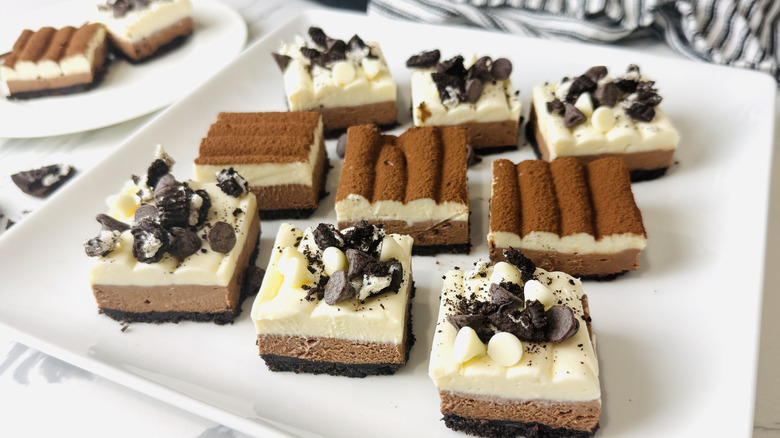 No-bake triple chocolate cheesecake bars on plate